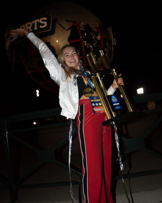 Mel Bull with the championship trophy at the sports complex